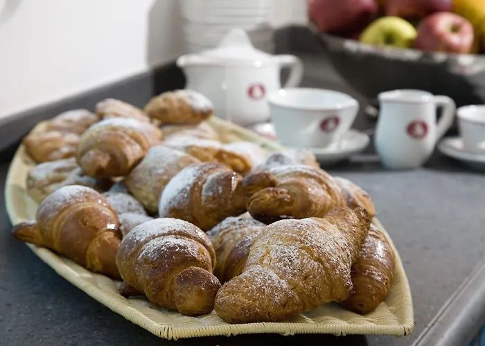 מלון Gatto Bianco 4*